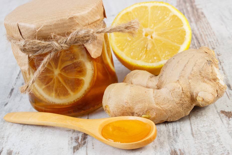 Fresh lemon, honey and ginger on wooden table, healthy nutrition