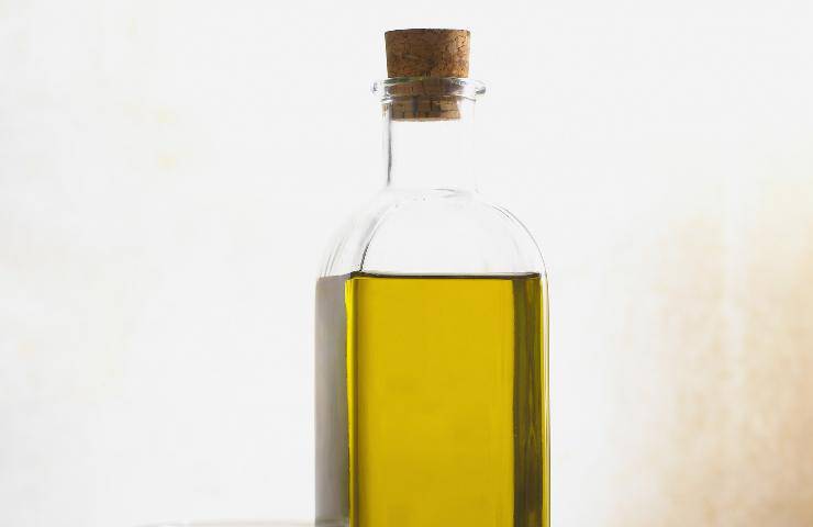 Cucchiaio olio d'oliva acqua cottura